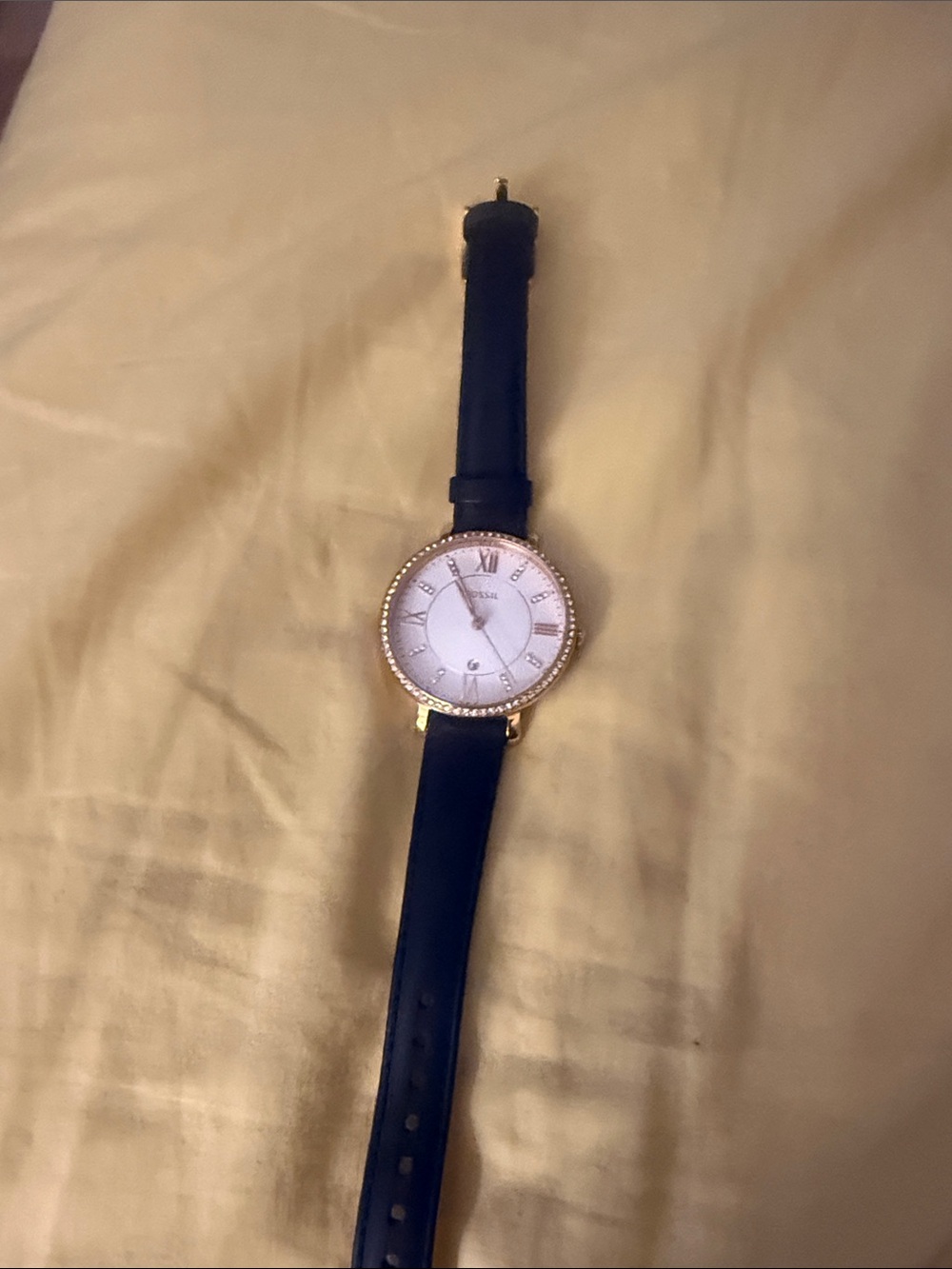 Fossil Gold-Tone Watch with Black Strap and White Dial